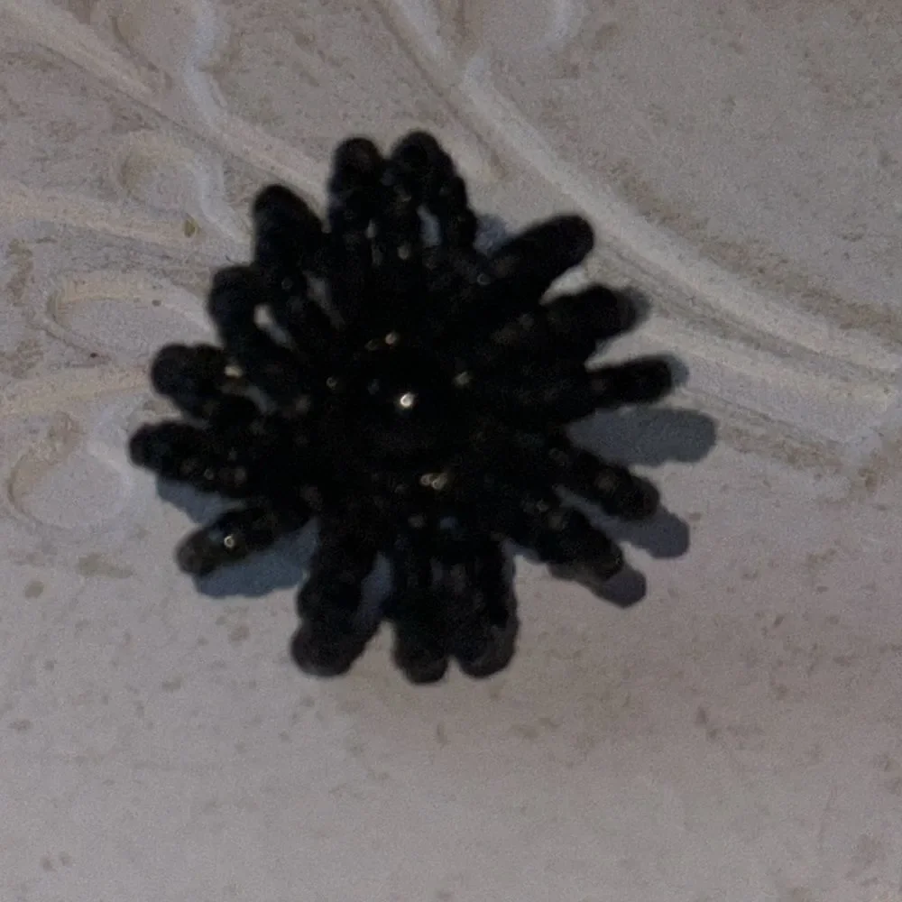 Black beaded vintage screw on earrings